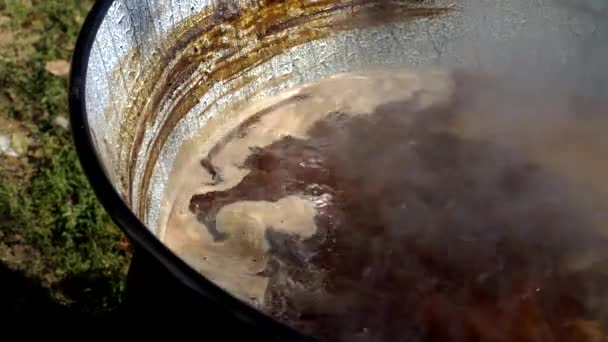 Old way of making apple jam-Cooking - Filmmaterial, Video