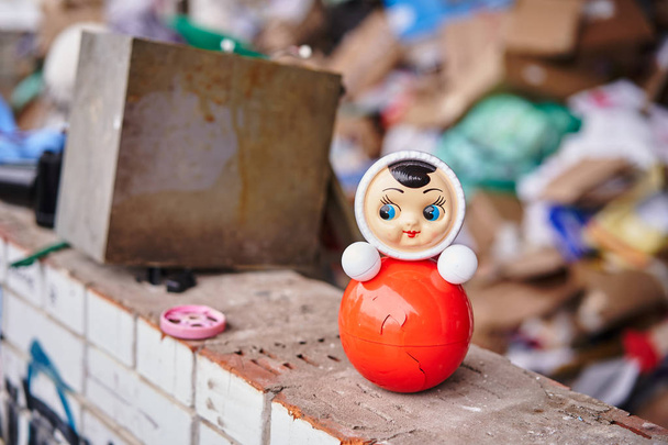 Plastic toy among the heaps of garbage - Foto, imagen