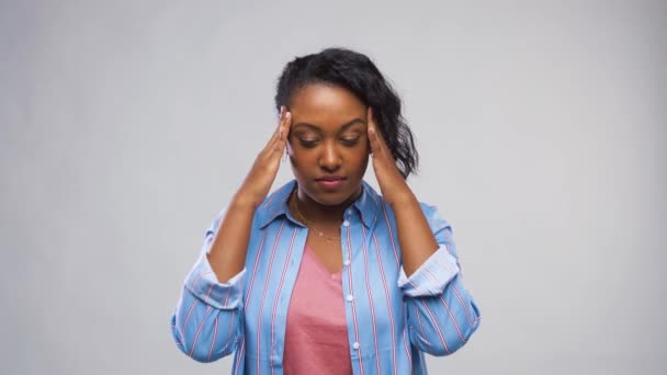 african american woman suffering from headache - Video, Çekim
