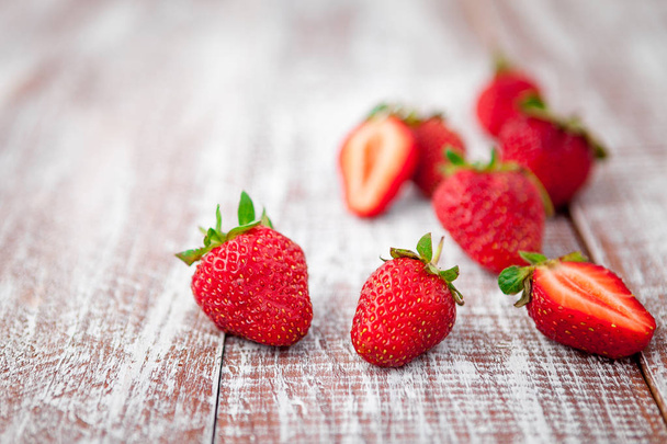 strawberry isolated on a wood background  - Valokuva, kuva