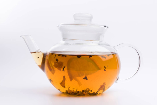 Glass teapot with black tea isolated on white background - Photo, Image