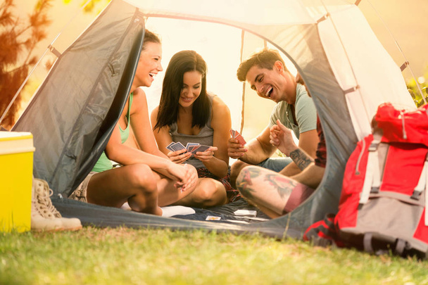  people laughing and joke while sitting in tent - Valokuva, kuva