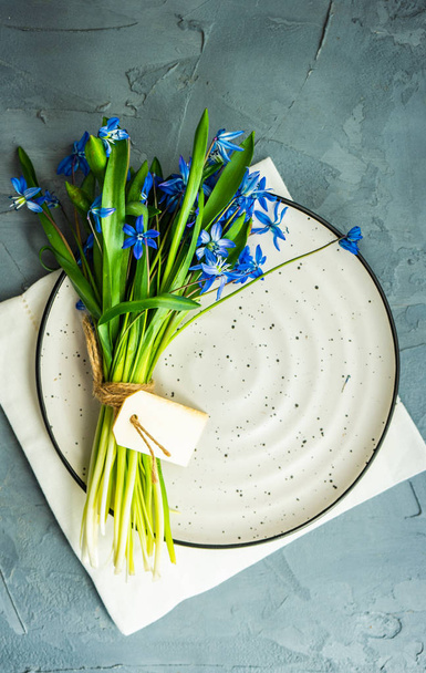 Spring table setting with blue scilla siberica - Photo, Image