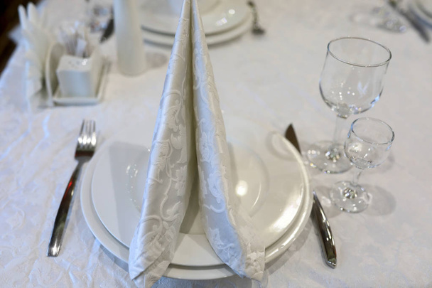 White napkin in form of sail - 写真・画像