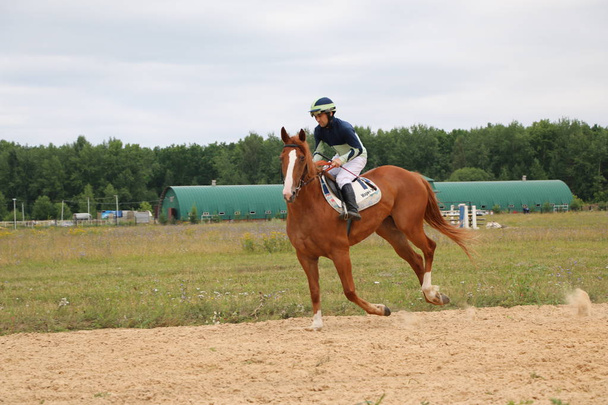 Yoshkar-Ola, RUSSIA, July 29, 2018: Horse racing and jumping on  - Photo, Image