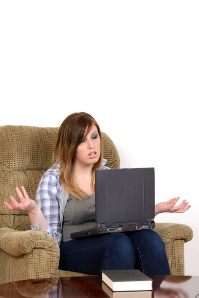 upset teen girl with laptop and copy space - Foto, Imagen