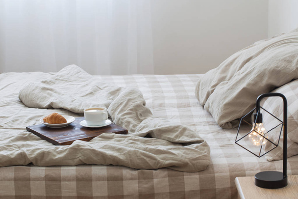 coffee on  tray on the bed in bedroom - Photo, image