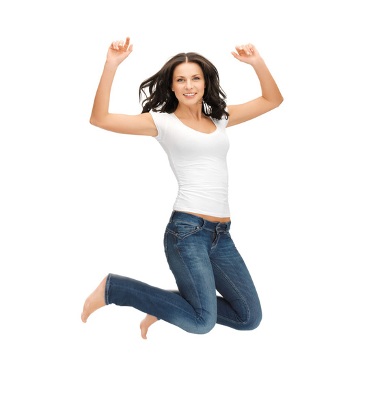 Jumping woman in blank white t-shirt - Фото, изображение