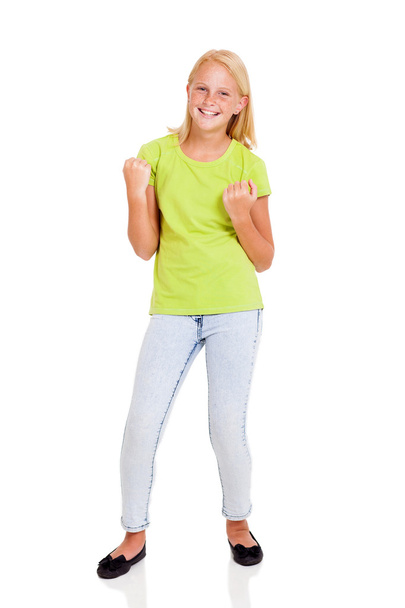 cheerful preteen girl waving fist - Zdjęcie, obraz