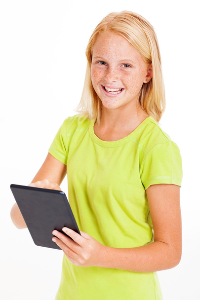 pre teen girl using tablet computer - Fotoğraf, Görsel
