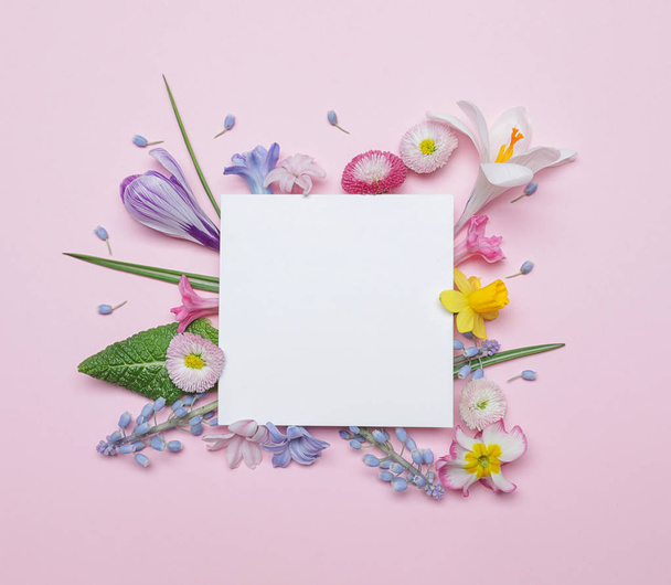 Flat lay composition with spring hyacinth flowers and blank card on color background, space for text - Photo, Image