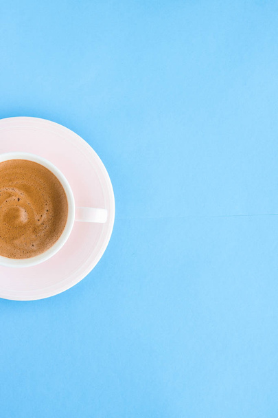 Hot aromatic coffee on blue background, flatlay - Photo, Image