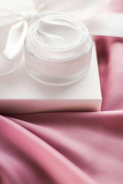 Luxury moisturizing cream and a white gift box - Photo, Image