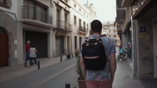Young tourist walking around in city. - Video, Çekim