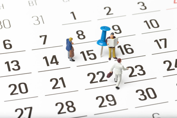 miniature people on calendar background - Photo, Image