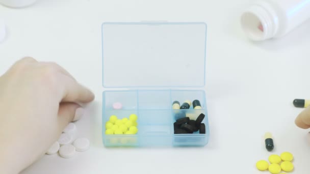 Tabletas en caja de la píldora
 - Imágenes, Vídeo