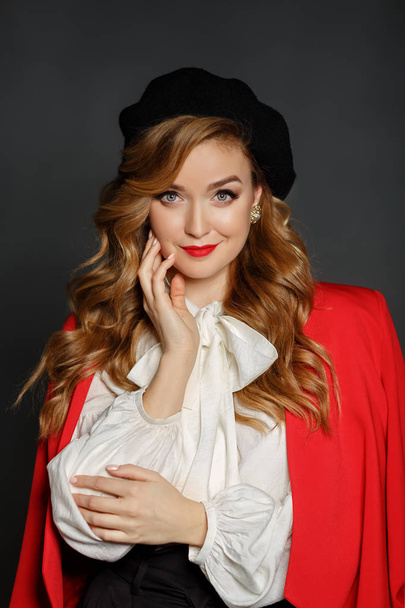 Very beautiful stylish girl with red lips in a jacket and beret  - Fotografie, Obrázek