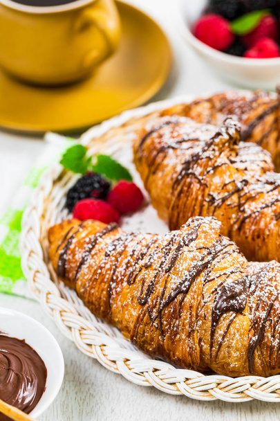 Chocolate Croissants with Blackberries and Raspberries. Selective focus. - Photo, Image
