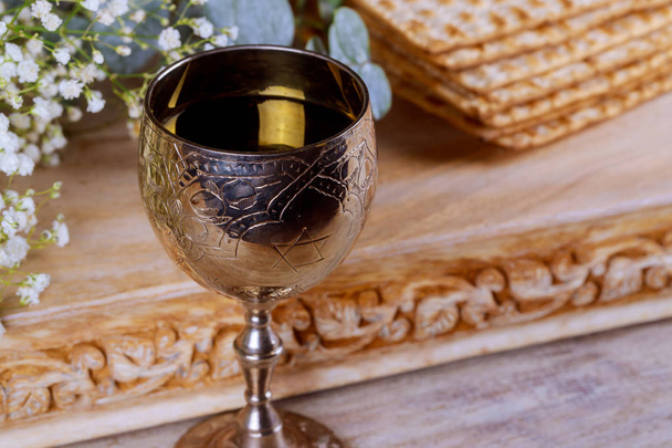 A Jewish Matzah bread with wine. Passover holiday concept - Foto, imagen