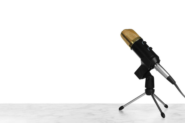 Microphone on table against white background. Space for text - Fotoğraf, Görsel
