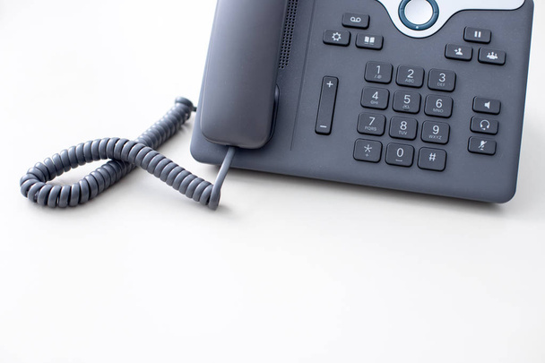 Classical black telephone in the office, customer support and te - Foto, Imagen