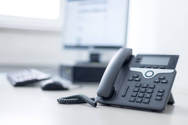 Classical black telephone in the office, customer support and te - Foto, immagini