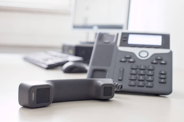 Classical black telephone in the office, customer support and te - Fotoğraf, Görsel