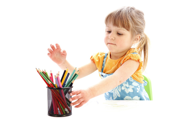 beautiful little girl drawing with pencils - Fotografie, Obrázek
