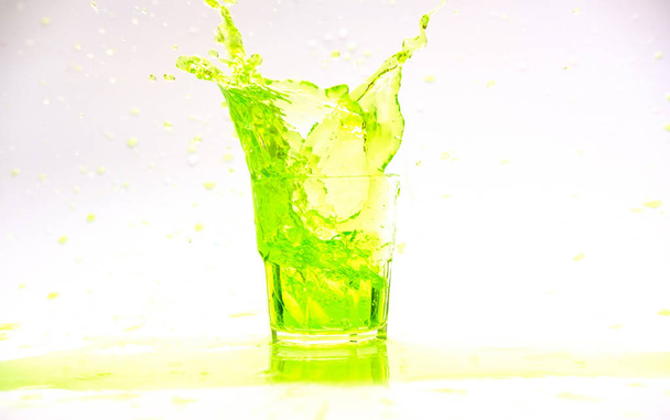cool drinks and water splash on white background - Photo, Image