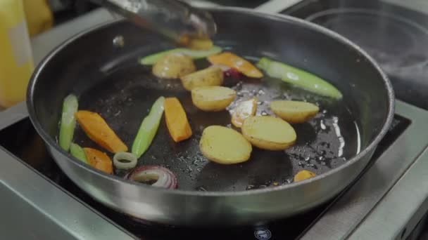 Frying ingredients on frying pan. - Footage, Video