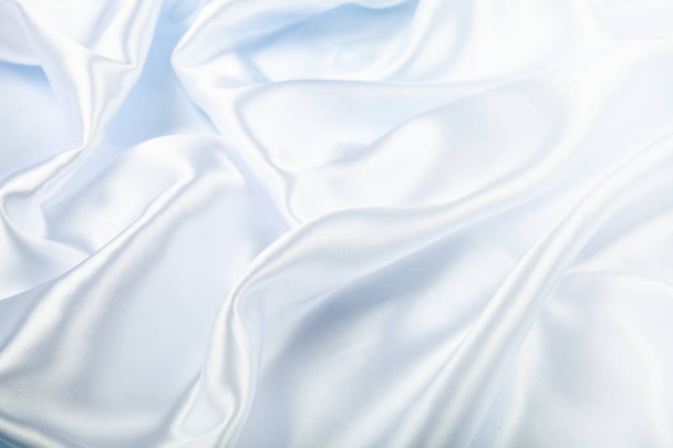 White silk fabric with folds.  - Valokuva, kuva