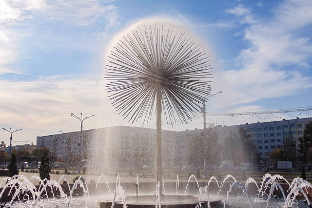 The fountain in the form of a ball against the blue sky - Photo, Image