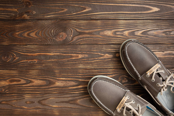 man brown shoes  on the wooden background - Foto, Imagem