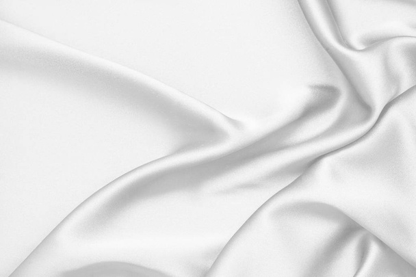 Rippled white silk fabric satin cloth waves background - Foto, Imagen
