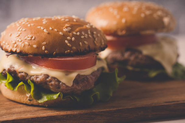Hamburgers or sandwiches is the popular fast food for brunch or lunch. - Foto, Imagem