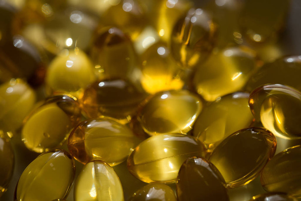 cod-liver oil in capsules macro - Photo, Image