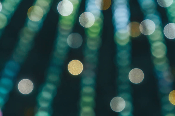 Christmas tree is all in the lights in blur - Фото, зображення
