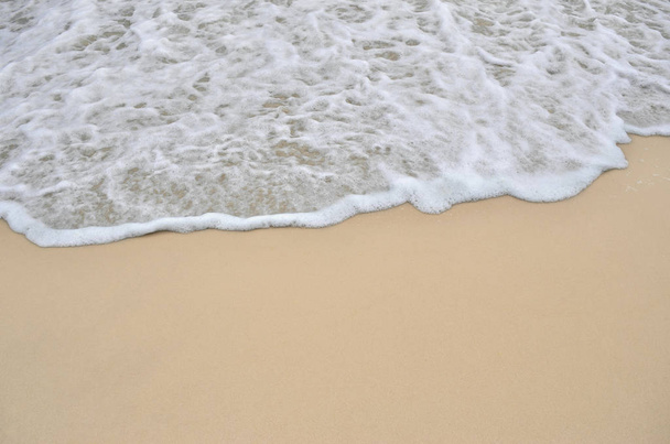 Tidal wave on a clean, sandy, sea beach - Photo, Image