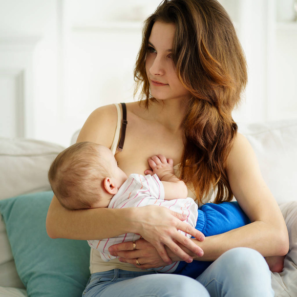 young mother breastfeeding her little son - Φωτογραφία, εικόνα
