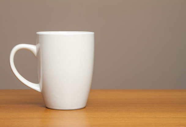 White mug on wooden table - Photo, Image
