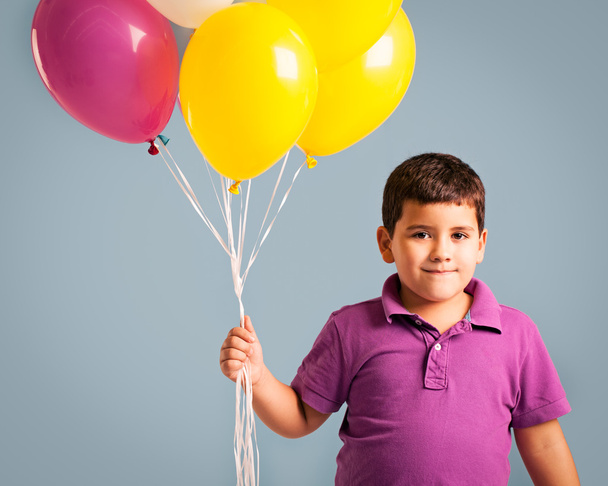 Boy Holding Balloons - Foto, afbeelding