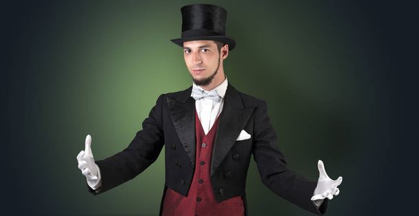 Magician holds something invisible  - Foto, imagen