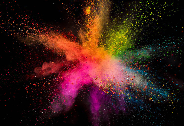 Colored powder explosion on black background. - Foto, afbeelding