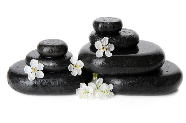 Spa stones and white flowers isolated on white - Foto, Imagem