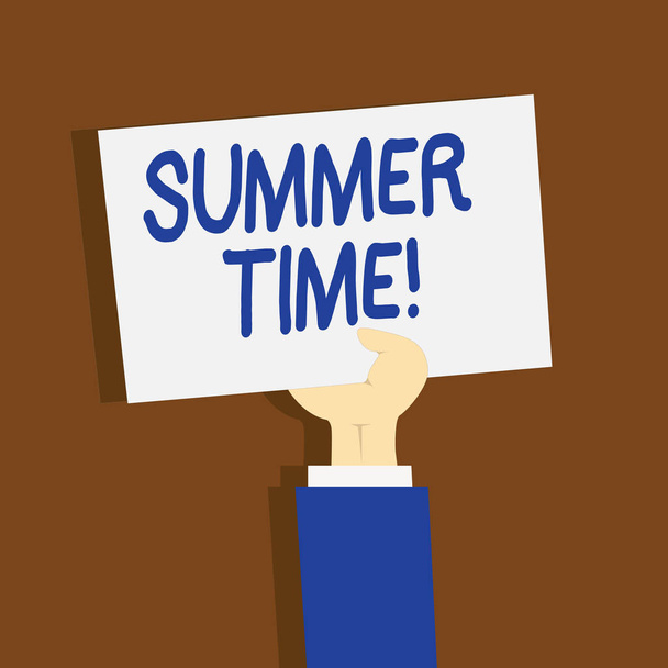 Writing note showing Summer Time. Business photo showcasing achieve longer evening daylight summer setting clocks hour ahead Clipart of Hand Holding Up Sheet of Paper on Pastel Backdrop. - Photo, Image