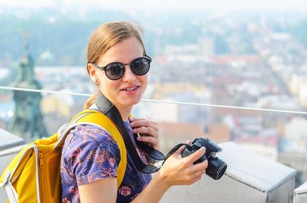 Young Girl Tourist Takes Pictures of Sights - Photo, image