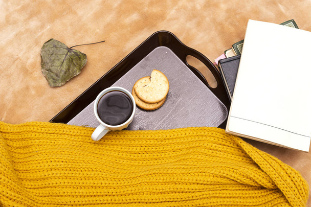 cup of coffee,  chocolate cookies and books  in tray during the morning - Zdjęcie, obraz