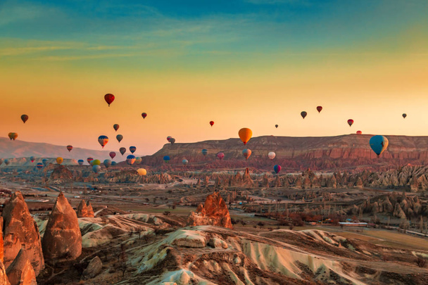 Hot air balloons in the sky over Cappadocia. - Фото, изображение
