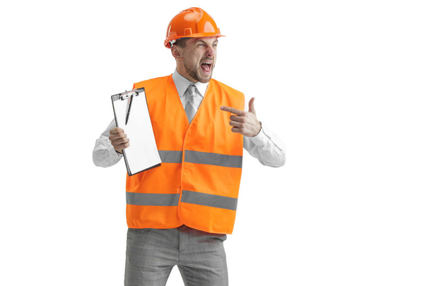 The builder in orange helmet isolated on white - Foto, imagen