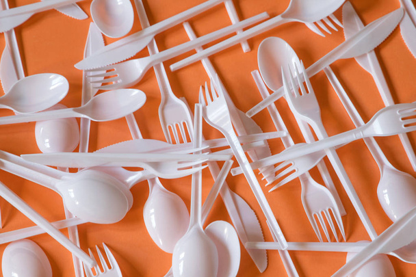 Plastic disposable cutlery, forbidden in European Union. - Foto, imagen